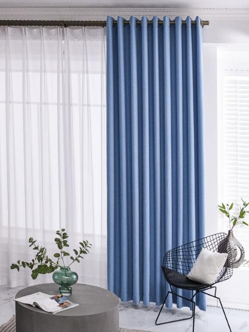 blackout curtains creating a more comfortable indoor environment.